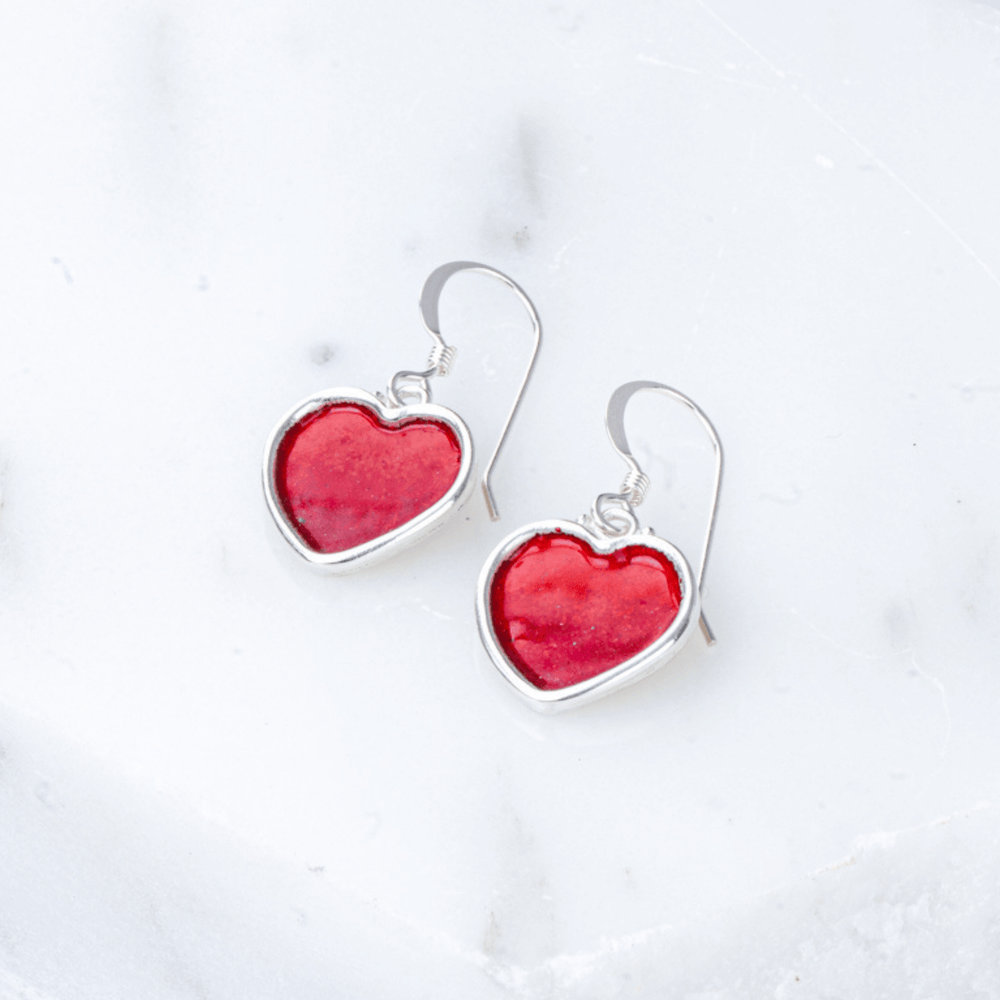 Heart earrings in solid red enamel.