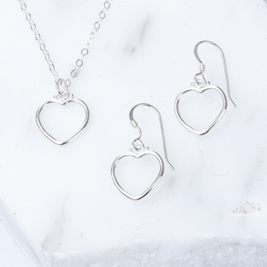 Heart plain silver necklace and earrings.