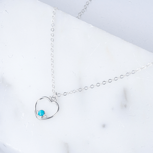 Heart turquoise necklace on silver.