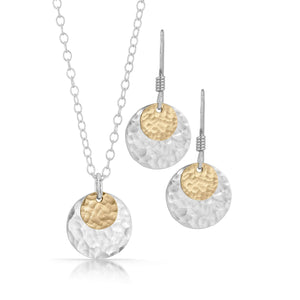 Small gold disc on large silver disc jewelry set.