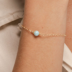
                
                    Load image into Gallery viewer, Alora Bracelet with Larimar on Gold Fill in closeup on model.
                
            