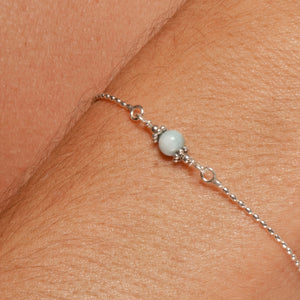 
                
                    Load image into Gallery viewer, Alora Bracelet with Larimar on Sterling in closeup on model.
                
            