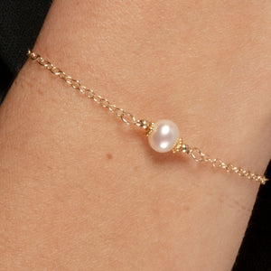 Alora Bracelet with Pearl on Gold Fill in closeup on model.