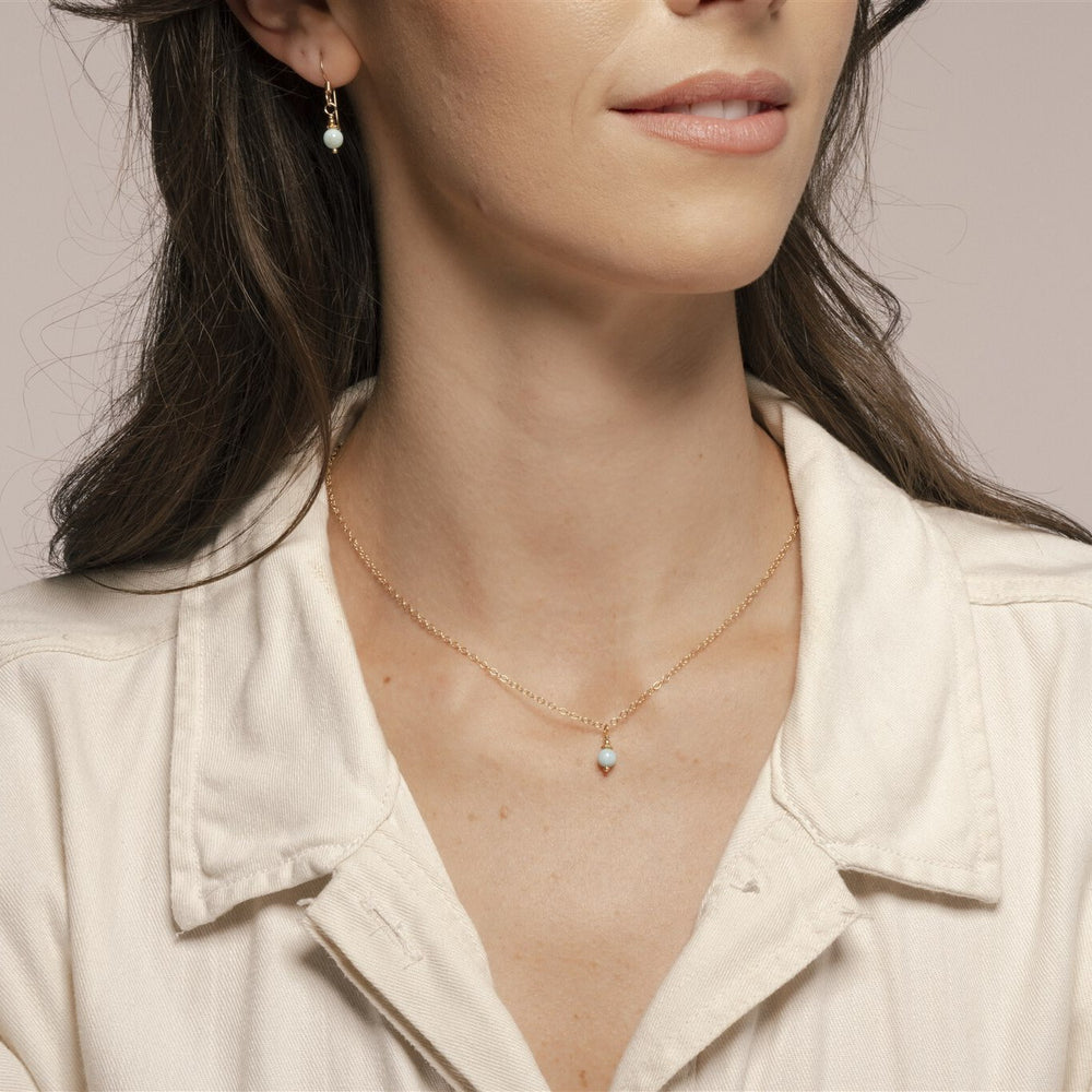 Alora Necklace with Larimar on 14k Gold Fill on model.