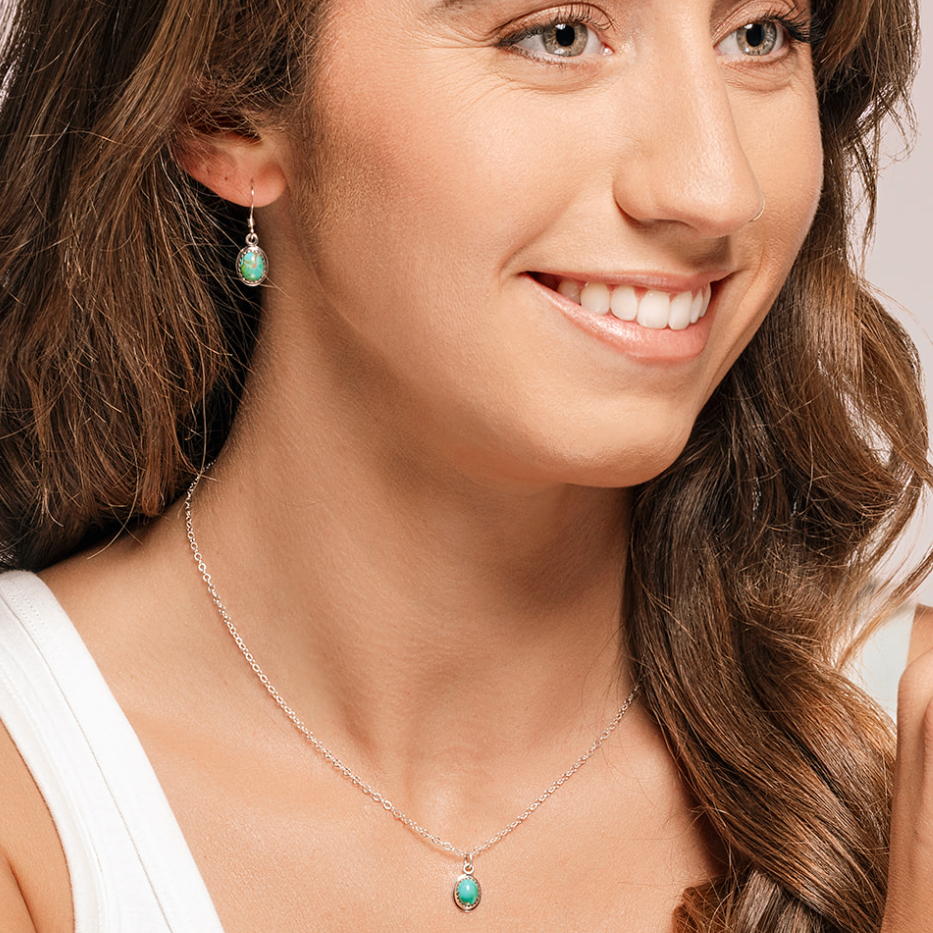 
                
                    Load image into Gallery viewer, Ria Turquoise Earrings and Necklace Set on model.
                
            
