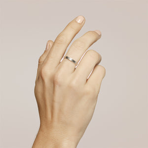
                
                    Load image into Gallery viewer, Aspen Ring in the narrow style on the model hand.
                
            