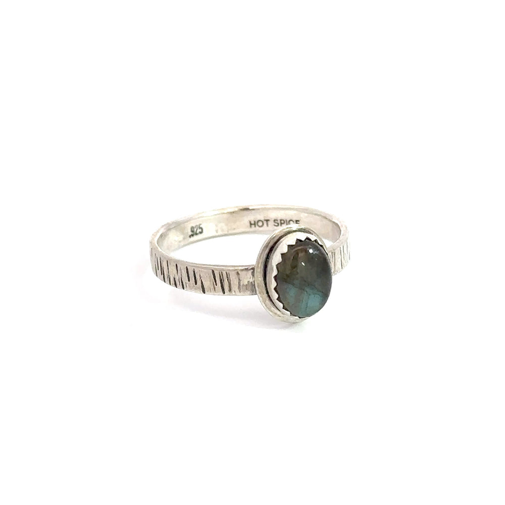 Ria ring with turquoise on model.