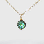 Abalone round necklace in goldfill.