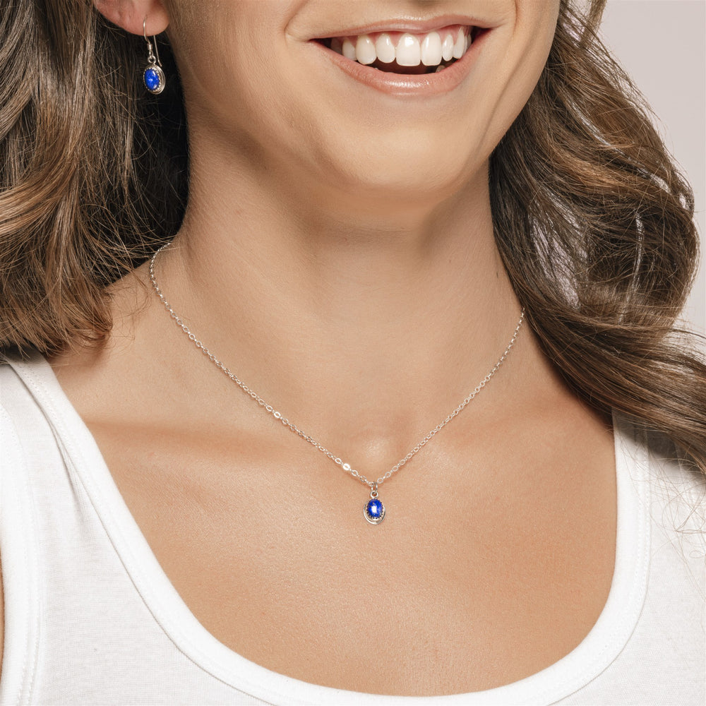 
                
                    Load image into Gallery viewer, Ria Necklace and Earrings with Lapis Lazuli on model.
                
            