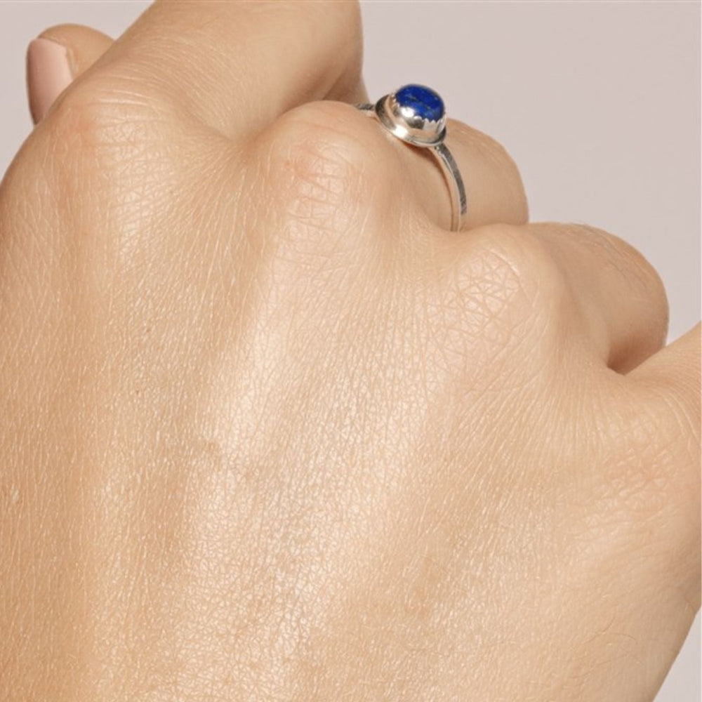 
                
                    Load image into Gallery viewer, Ria Ring with Lapis Lazuli on a model.
                
            