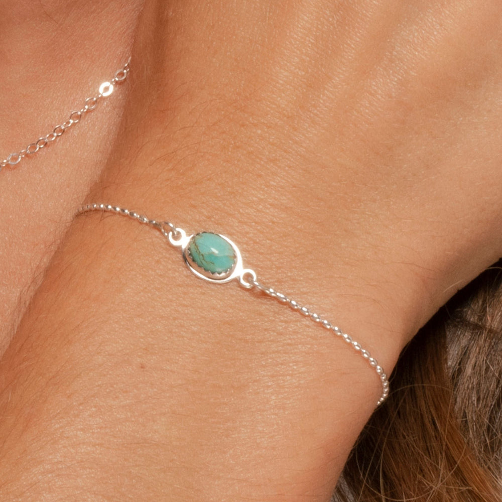 
                
                    Load image into Gallery viewer, Ria turquoise bracelet on model in closeup.
                
            