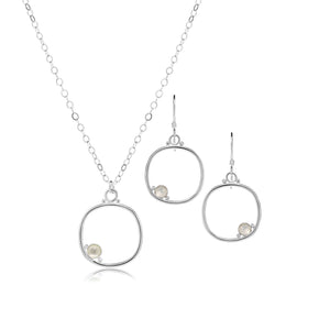 Cornerstone cushion frame jewelry set in medium size with moonstone.