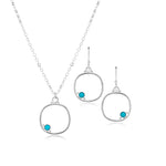 Cornerstone cushion frame jewelry set in medium size with lapis lazuli.