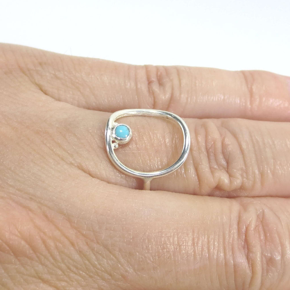 Turquoise cushion frame ring in Sterling Silver.