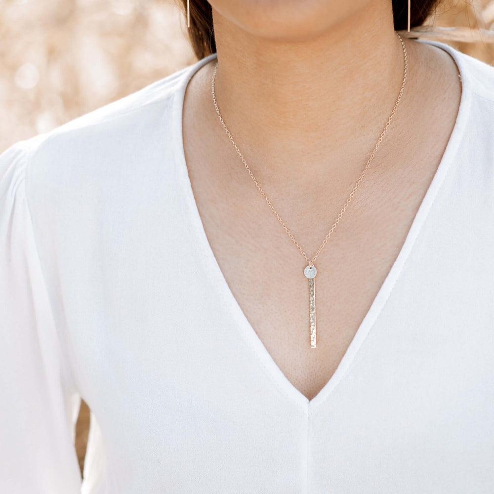 
                
                    Load image into Gallery viewer, Dot Skinny Bar Necklace on model.
                
            