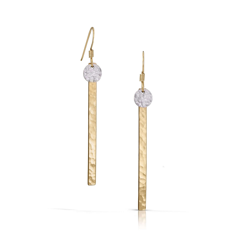 Small textured silver disc on gold skinny bar earrings.