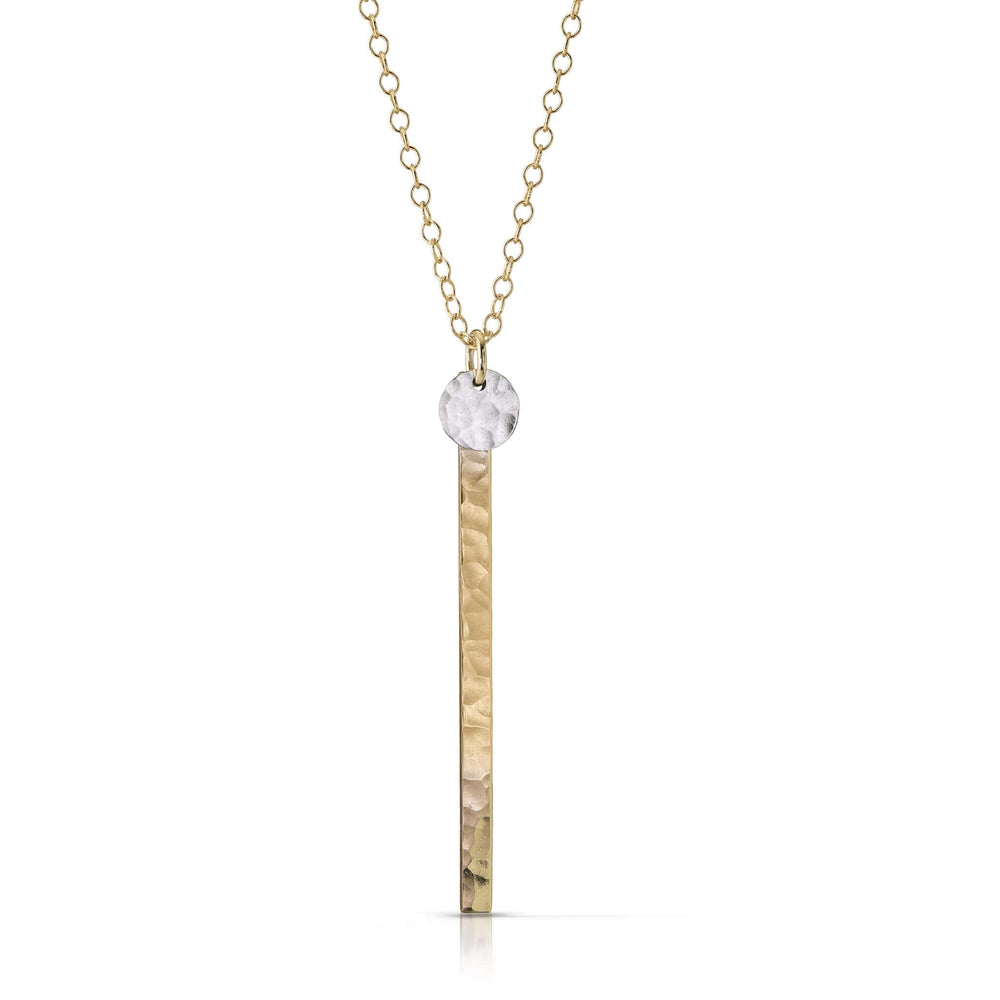 
                
                    Load image into Gallery viewer, Small textured silver disc on gold skinny bar necklace.
                
            