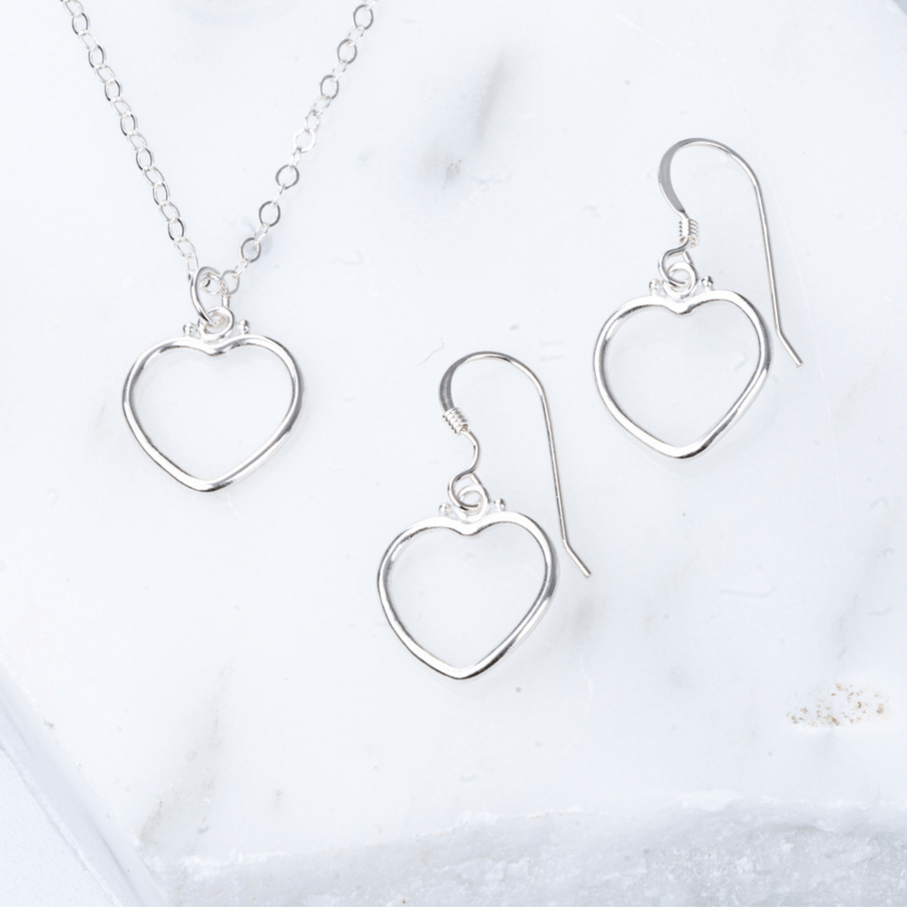 
                
                    Load image into Gallery viewer, Heart plain silver necklace and earrings.
                
            