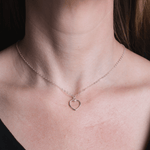 Heart plain necklace on model in Sterling Silver.