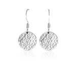 Textured silver flat round earrings.