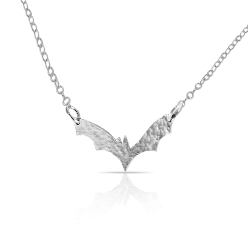 Silver flying bat necklace.
