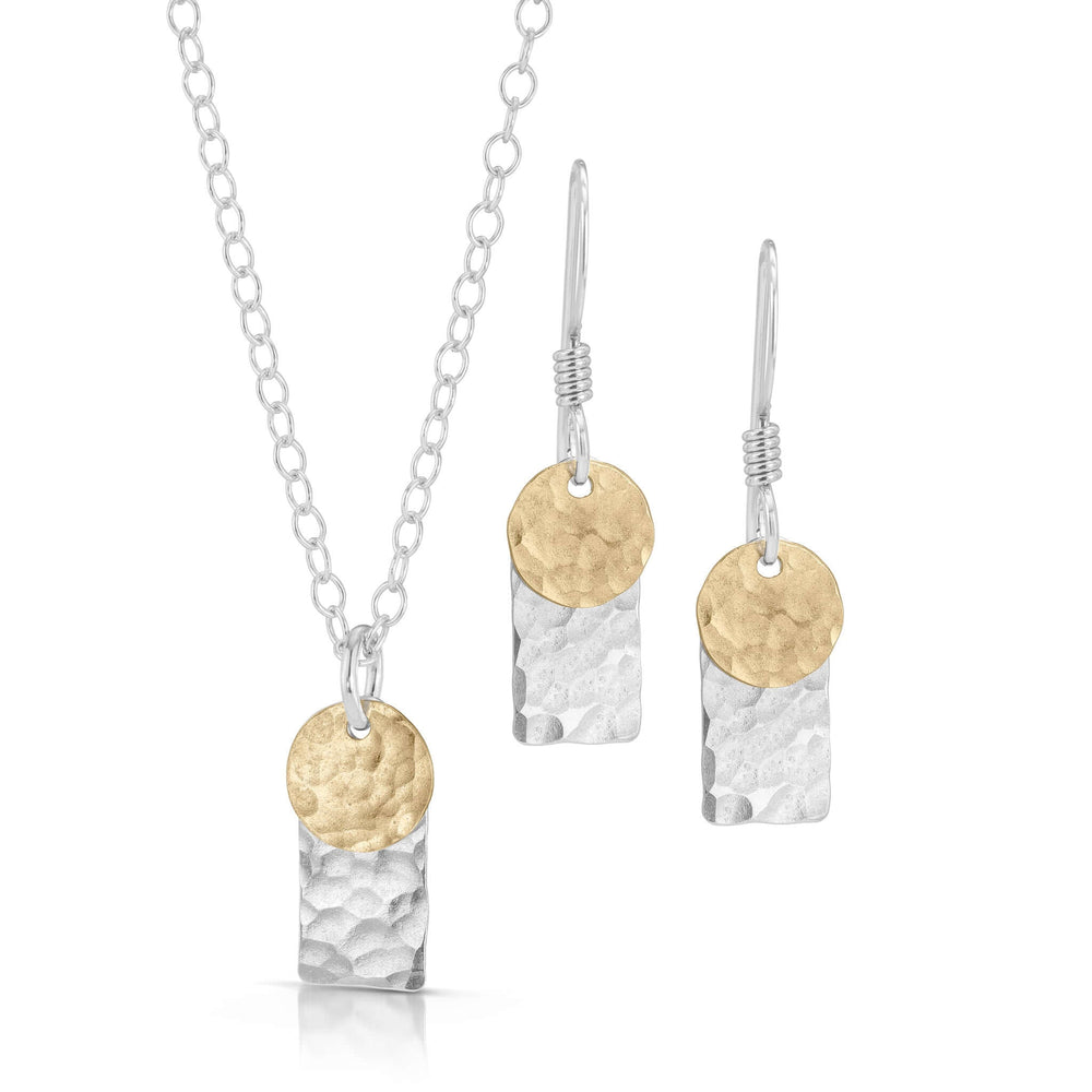 
                
                    Load image into Gallery viewer, Textured silver rectangle and gold disc jewelry set.
                
            